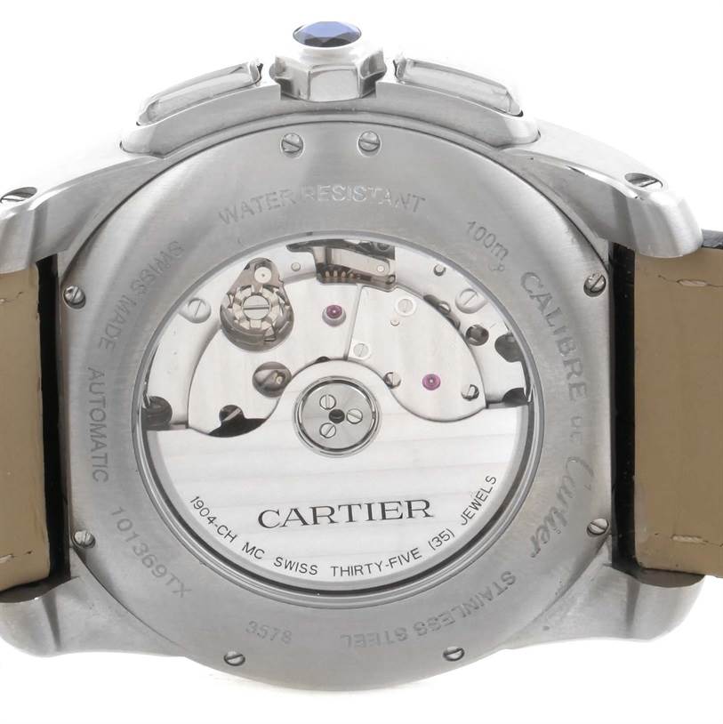 This is the back view of the Calibre de Cartier watch by Cartier, showing its movement through a transparent case back.
