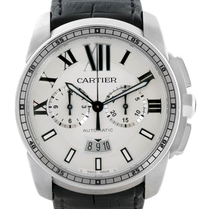 The image shows a frontal view of a Calibre de Cartier watch by Cartier, featuring its dial, subdials, and date window.
