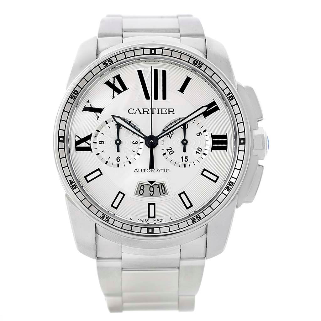 The image shows a front view of a Calibre de Cartier watch by Cartier, highlighting its face, bezel, and bracelet.