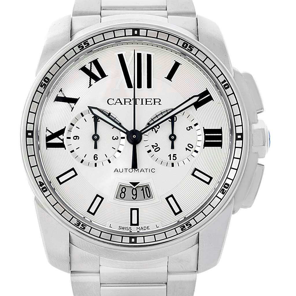 The image shows a front view of the Calibre de Cartier model by Cartier, displaying the dial, bezel, and bracelet.