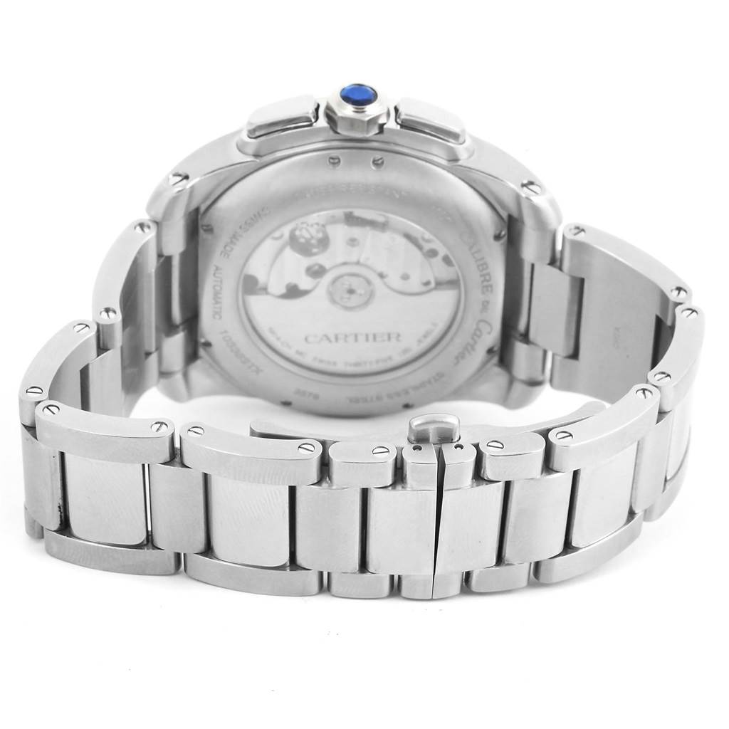 The image shows the back view and bracelet of the Calibre de Cartier watch by Cartier.