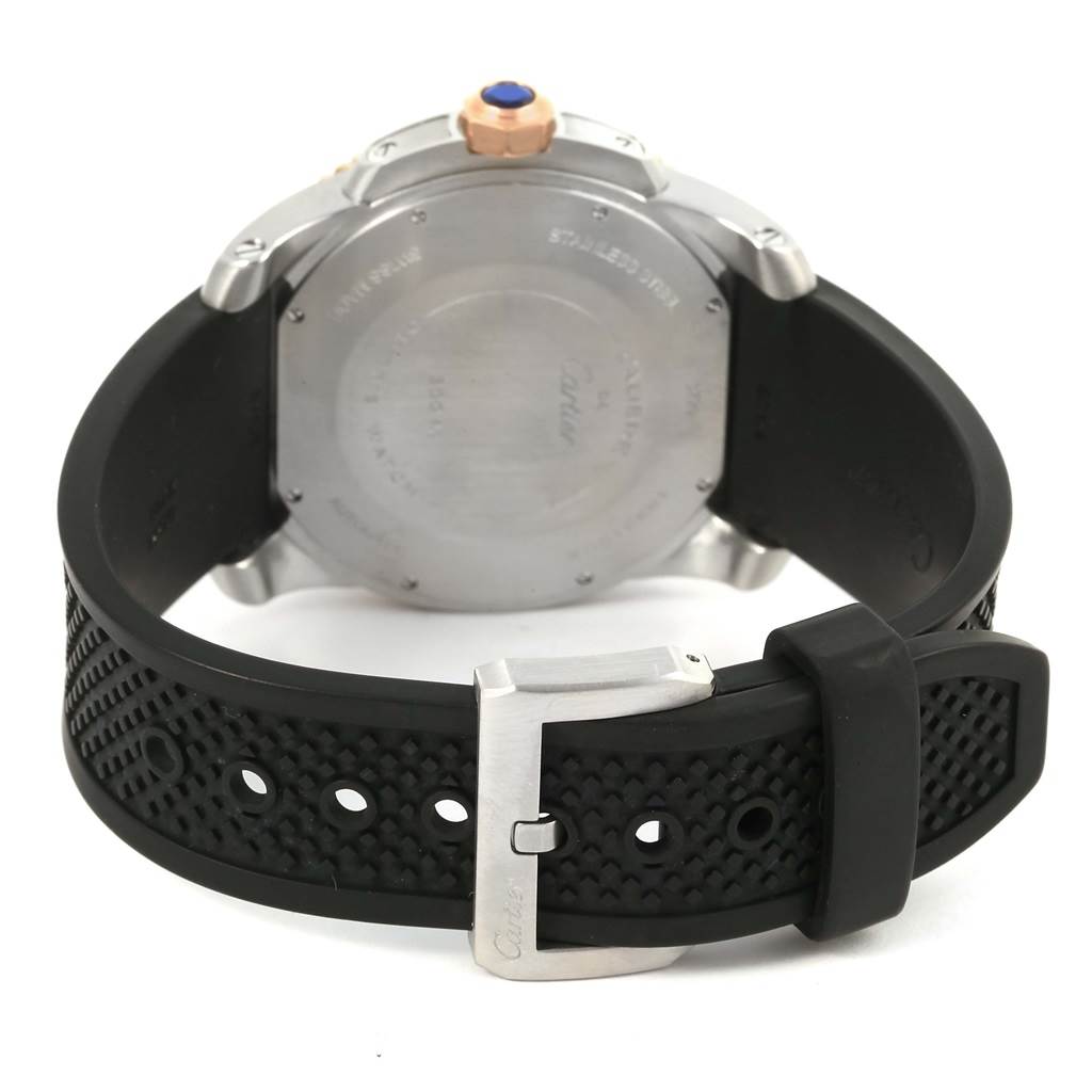 This image shows the back case and rubber strap of the Calibre de Cartier watch by Cartier from a rear angle.