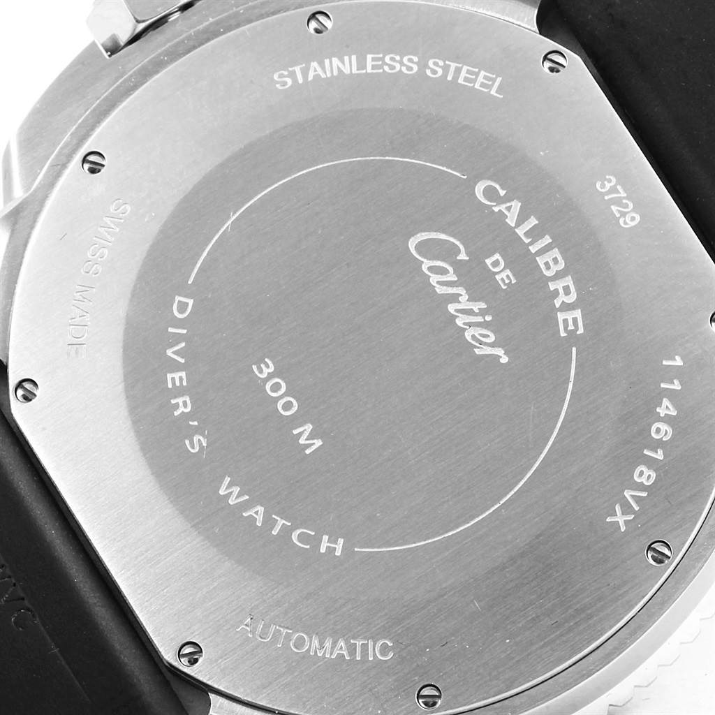 This image shows the back case of a Calibre de Cartier watch by Cartier, highlighting its specifications and materials.