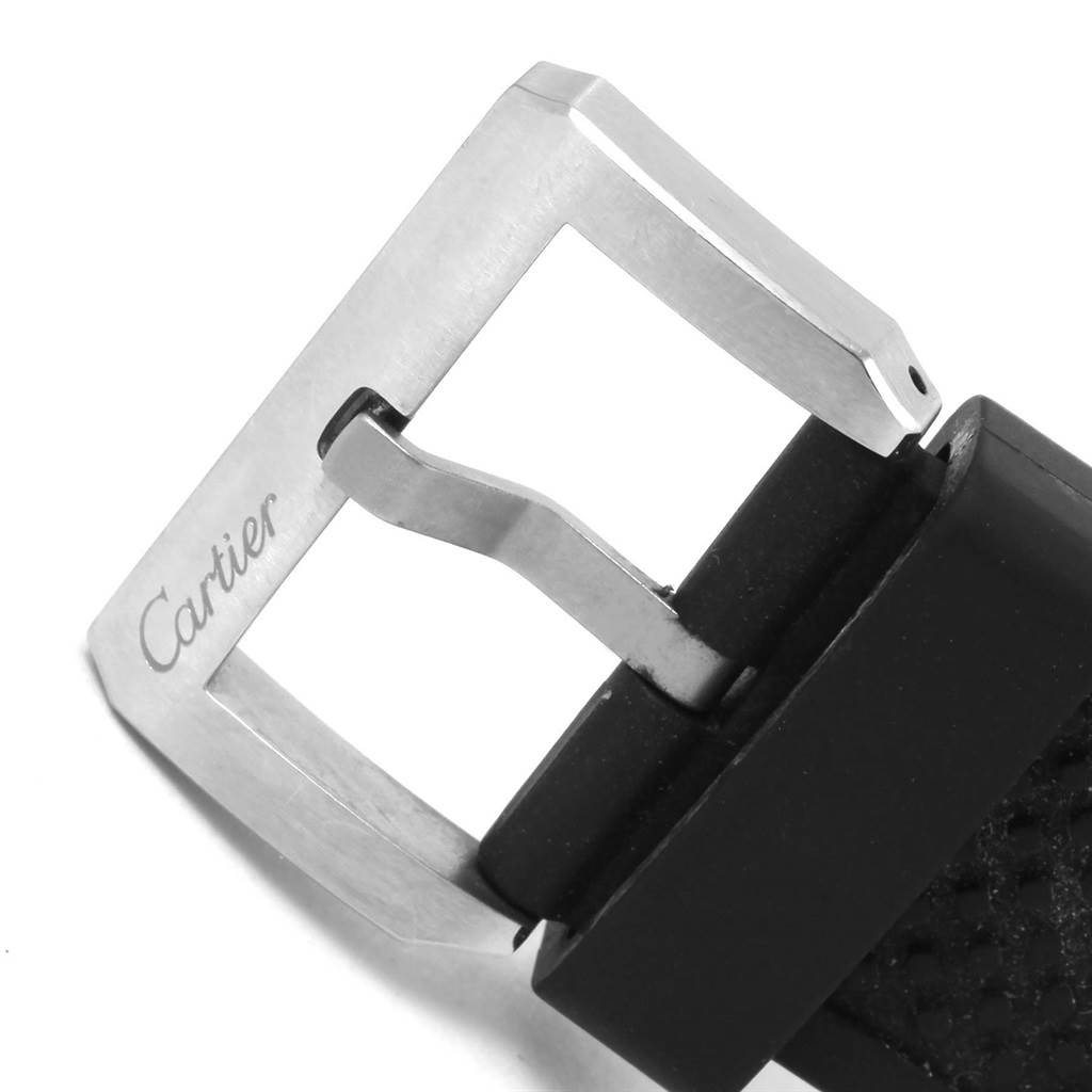 This image shows a close-up of the buckle and strap of a Calibre de Cartier watch by Cartier.
