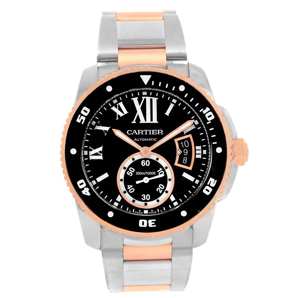 The image shows a front view of a Calibre de Cartier model watch by Cartier, highlighting the dial and bracelet details.