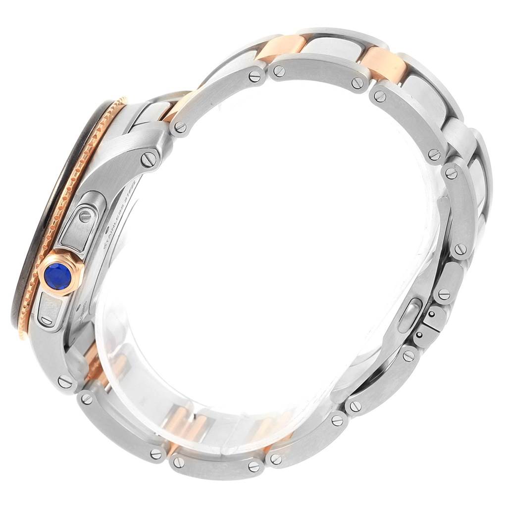 This side-angle image of the Calibre de Cartier watch by Cartier showcases the bracelet and crown.