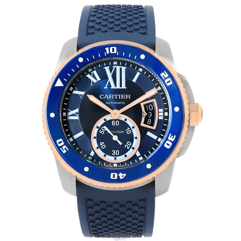 The image shows a front view of the Calibre de Cartier model by Cartier, displaying the dial, bezel, strap, and crown.