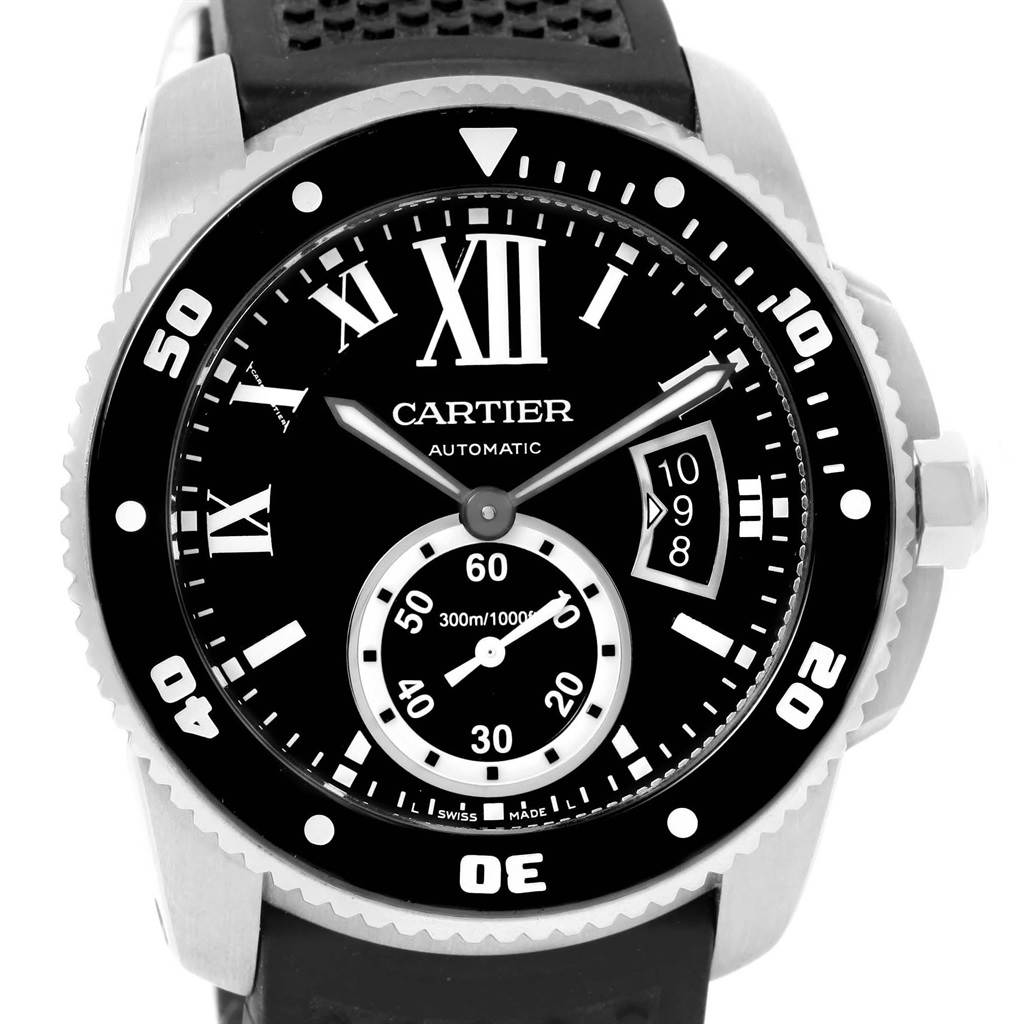 The image shows a front-angle view of the Calibre de Cartier watch by Cartier, highlighting the dial, bezel, and strap.