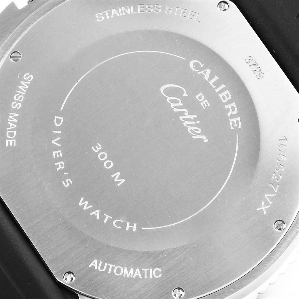 This image shows the back of the Calibre de Cartier watch, highlighting its stainless steel case and specifications like water resistance and automatic movement.