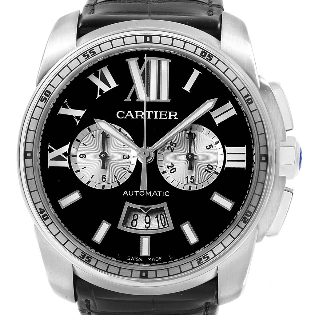 The image shows a frontal view of the Calibre de Cartier model by Cartier, highlighting the watch face, dials, and strap.