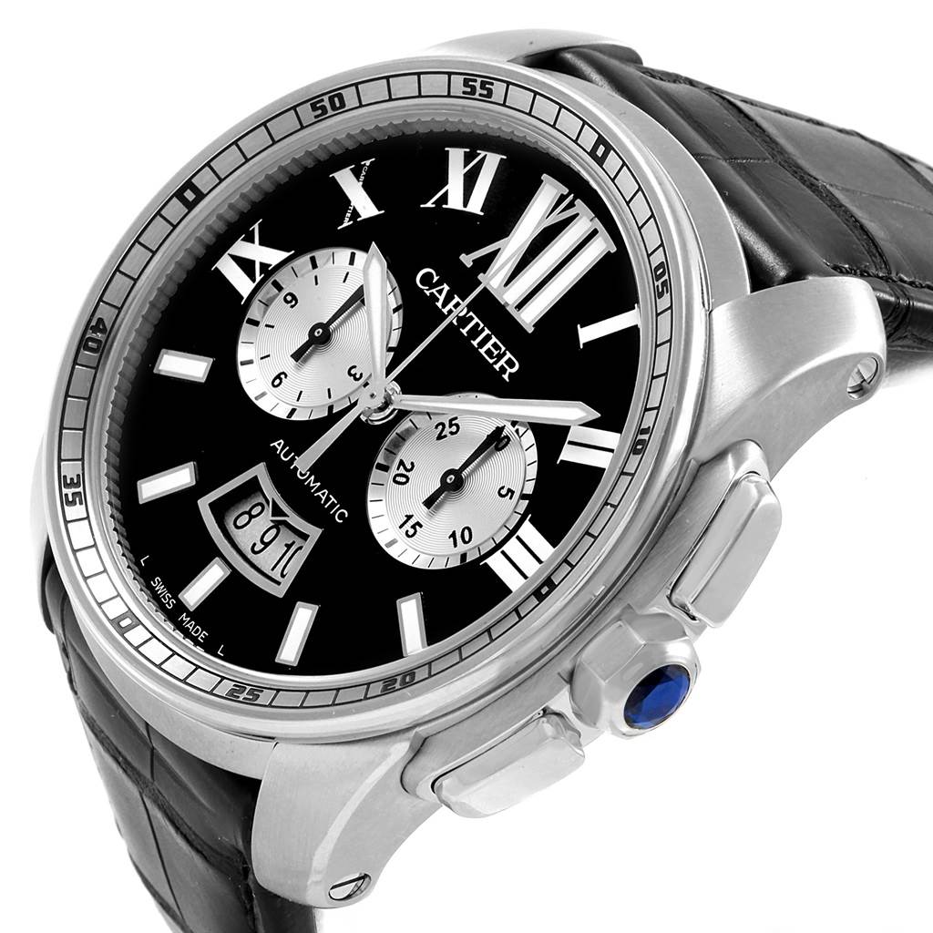 The image shows a Calibre de Cartier watch by Cartier, angled to display the dial, crown, bezel, and part of the strap.