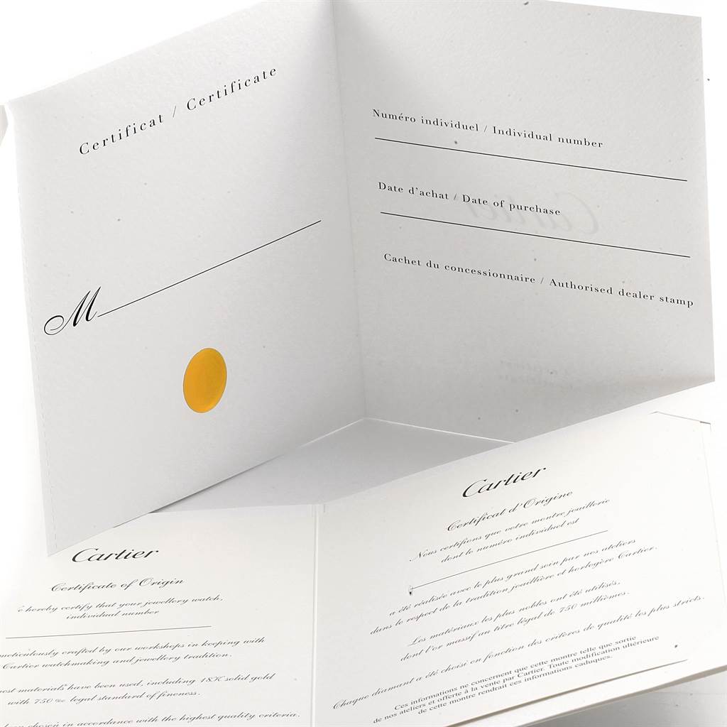 The image shows the warranty certificate and certificate of origin for the Calibre de Cartier model by Cartier.