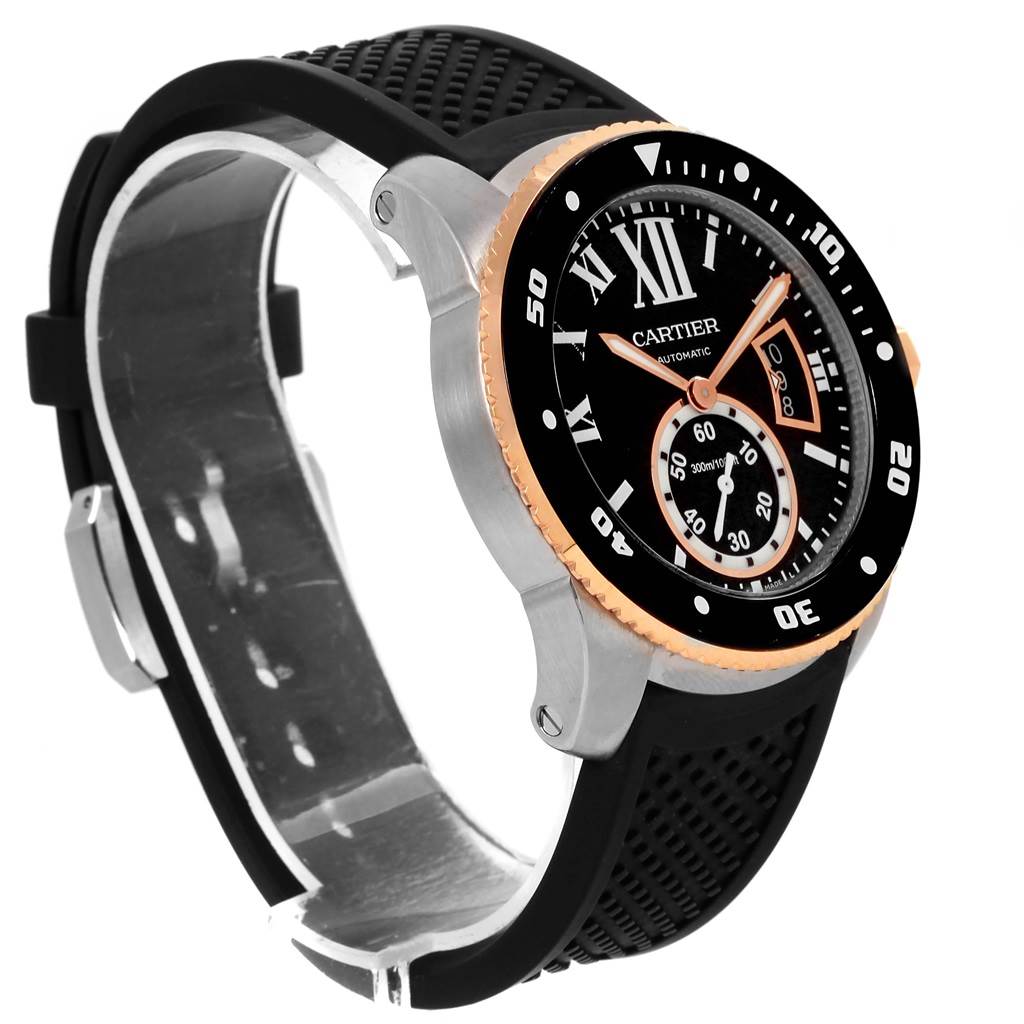 The Calibre de Cartier watch is shown at a three-quarter angle with a focus on the face, bezel, and rubber strap.