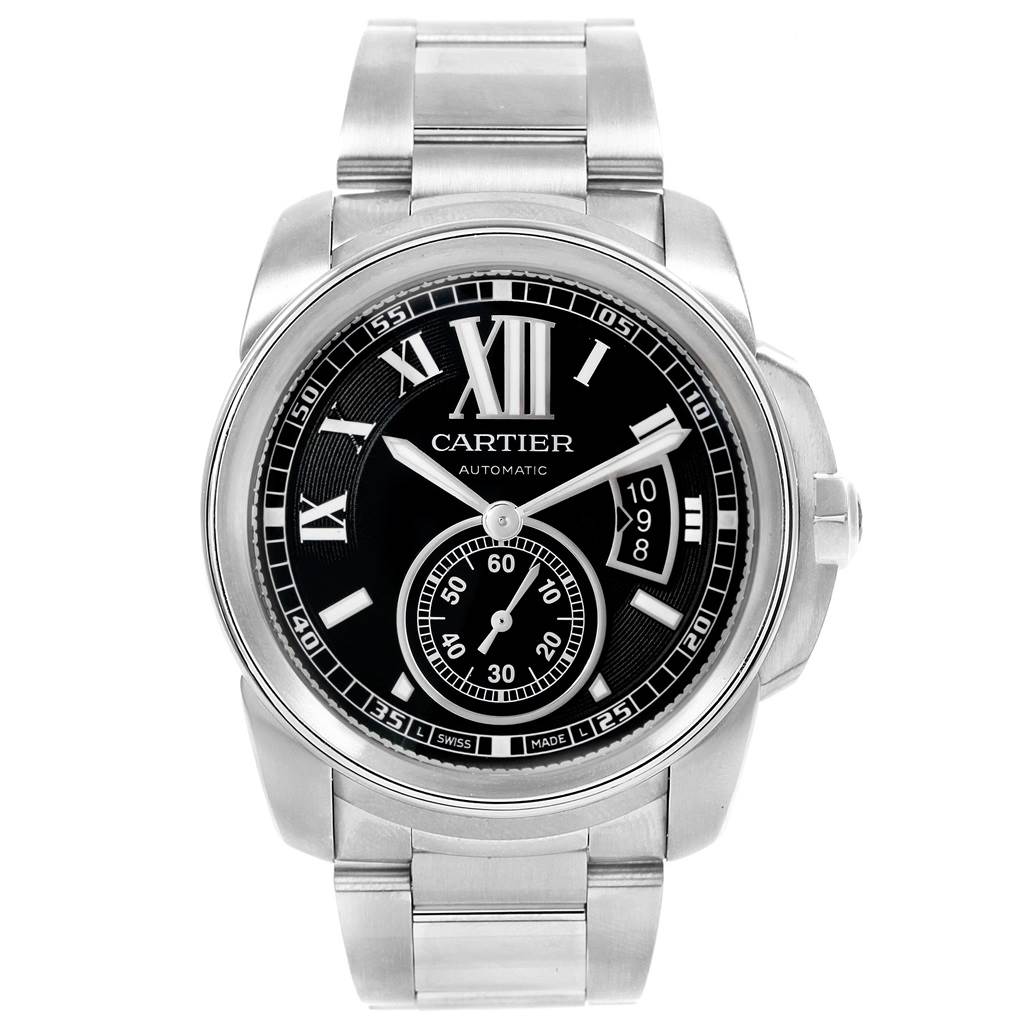 The image shows a frontal view of a Calibre de Cartier watch by Cartier, displaying its dial, bezel, and bracelet.