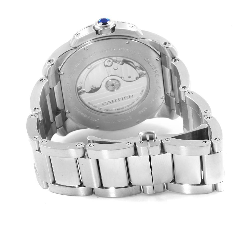 The image shows the back view of a Calibre de Cartier watch by Cartier, highlighting its back case and metal bracelet.