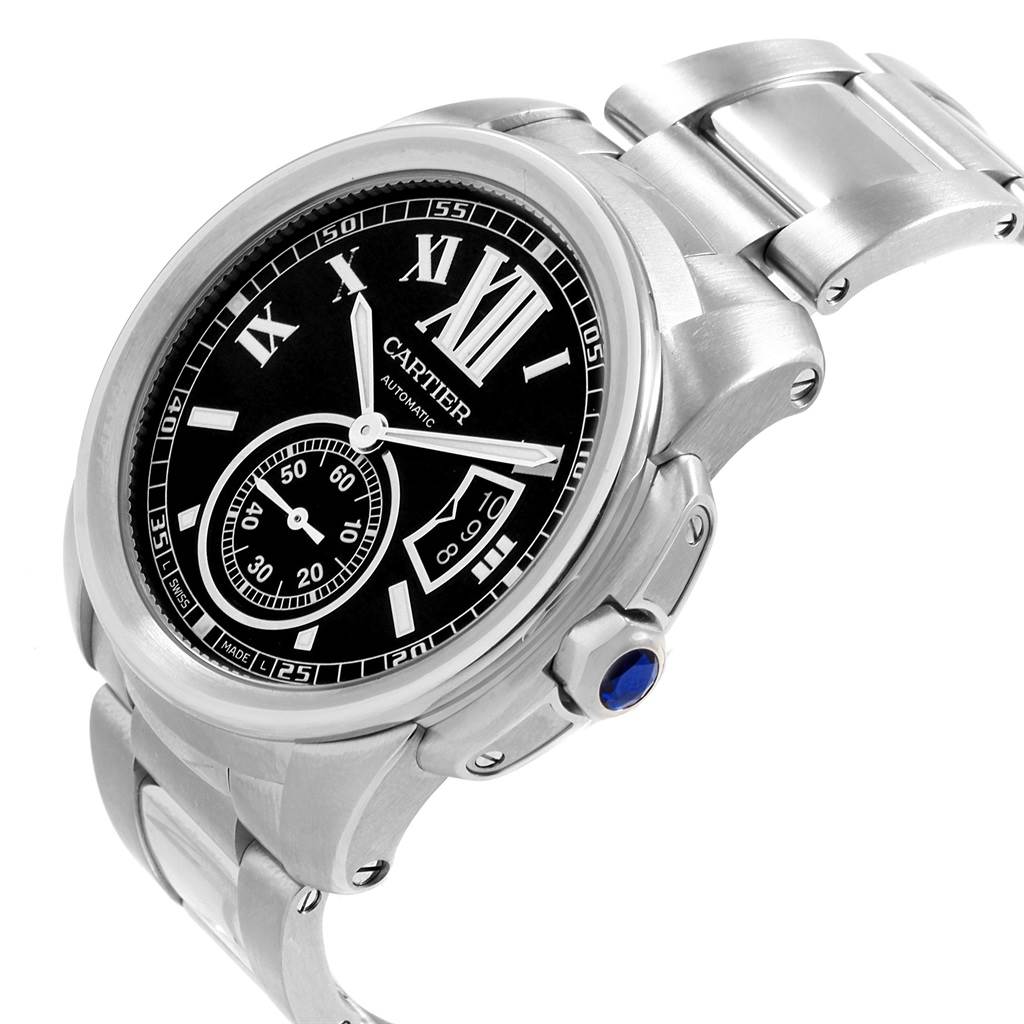 The image shows a Calibre de Cartier watch by Cartier at an angle highlighting the face, bezel, crown, and part of the bracelet.