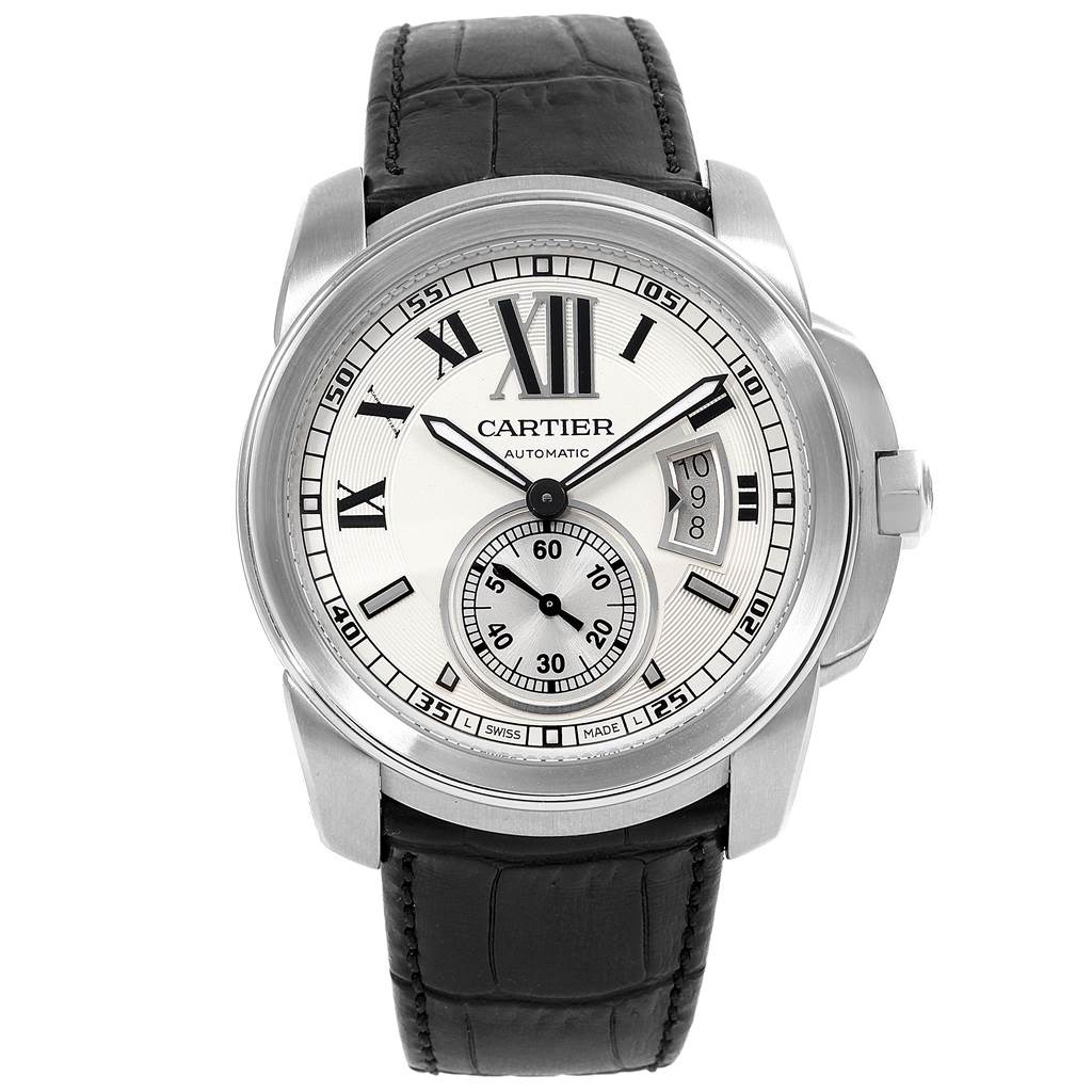 The image shows a front view of a Calibre de Cartier watch by Cartier, highlighting its dial, hands, date window, and leather strap.