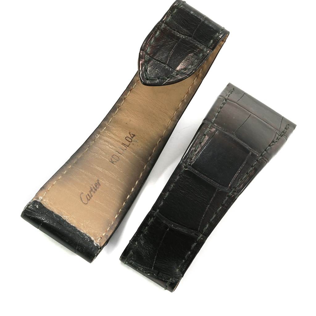 This image shows two black leather straps for the Calibre de Cartier watch by Cartier, displayed in a flat position.