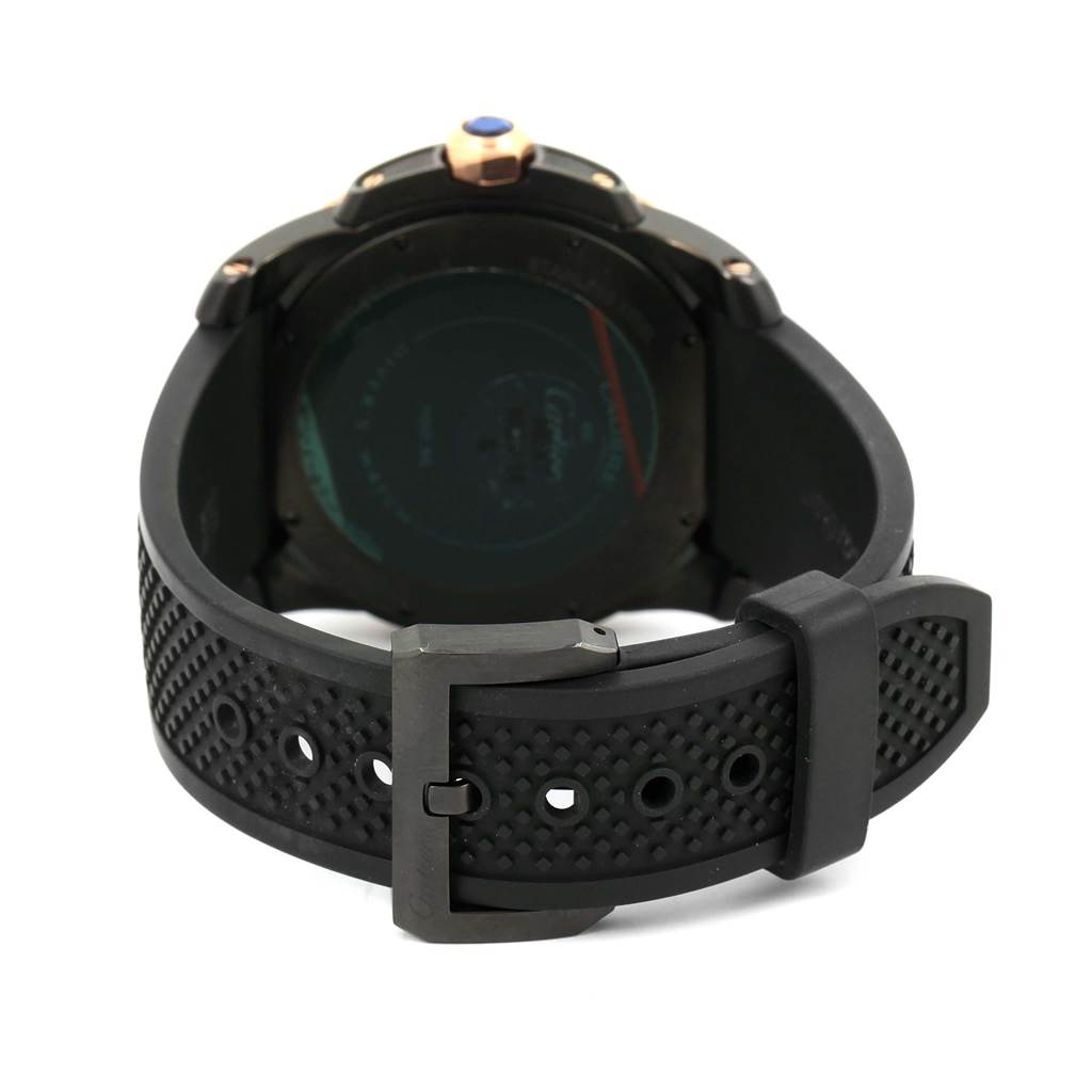 The image shows the back view of a Calibre de Cartier watch by Cartier, highlighting the strap and buckle.