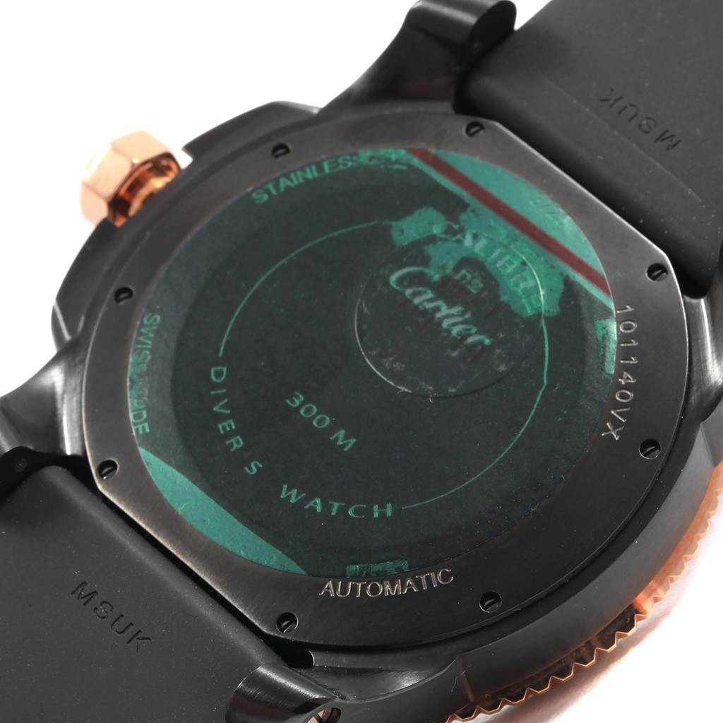 This image shows the back view of the Calibre de Cartier watch by Cartier, highlighting the case back and strap attachment.