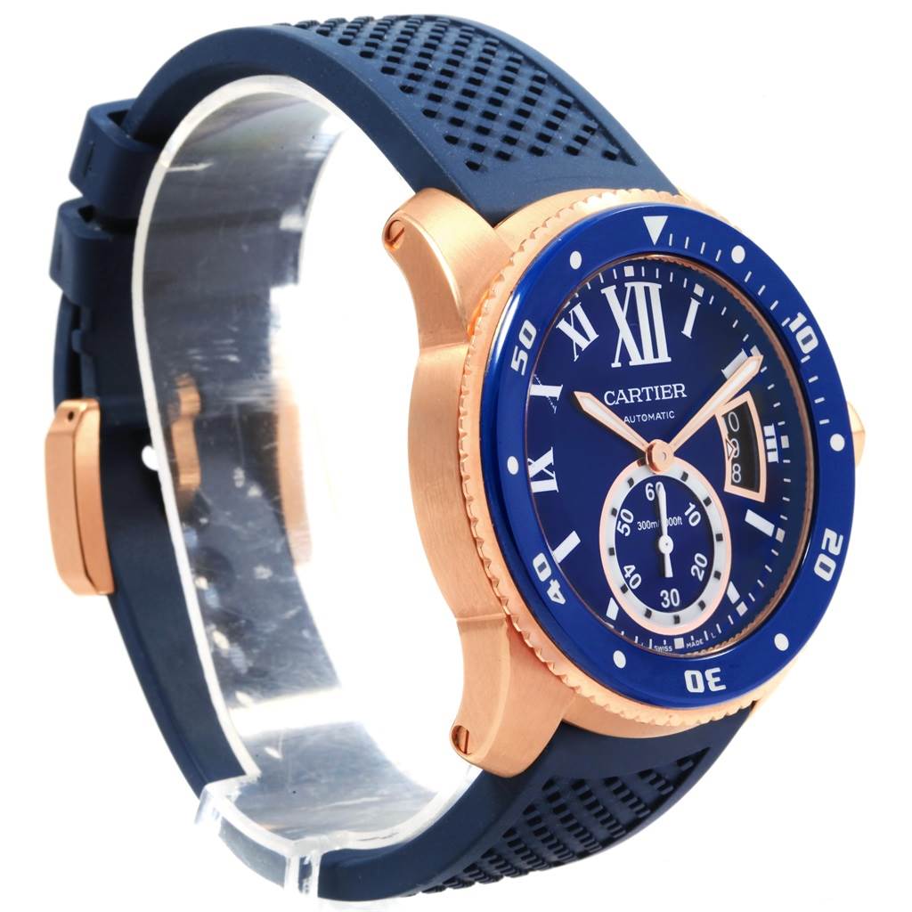 The image shows a Calibre de Cartier watch by Cartier, viewed from an angled side, highlighting the face, bezel, and band.