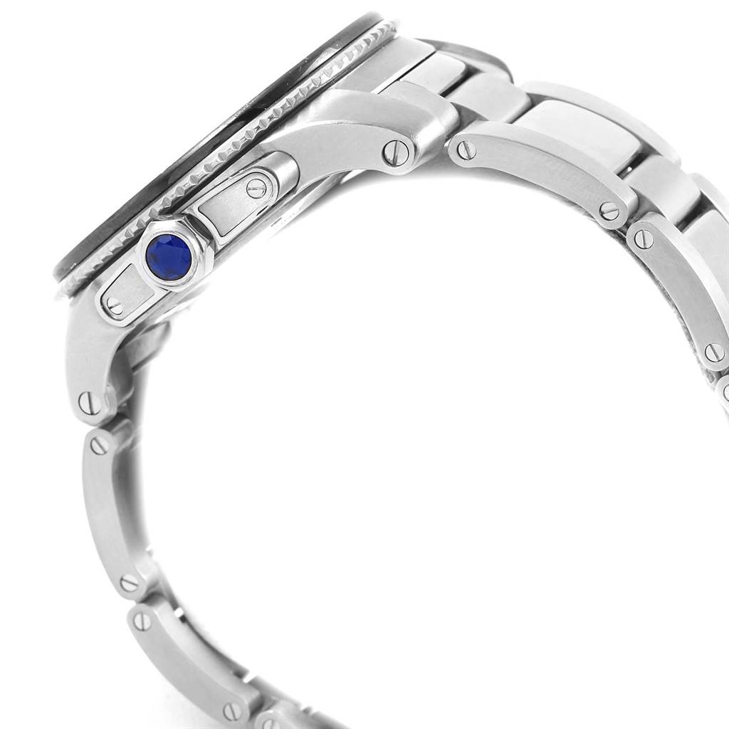 This image displays a side view of a Calibre de Cartier watch by Cartier, showcasing the crown and part of the metal bracelet.