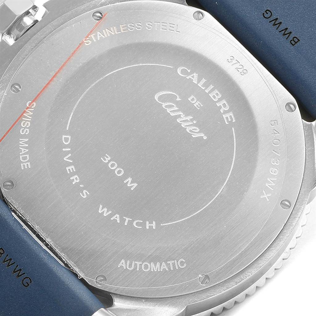 This image shows the back case of a Calibre de Cartier by Cartier, detailing its specifications including water resistance and material.