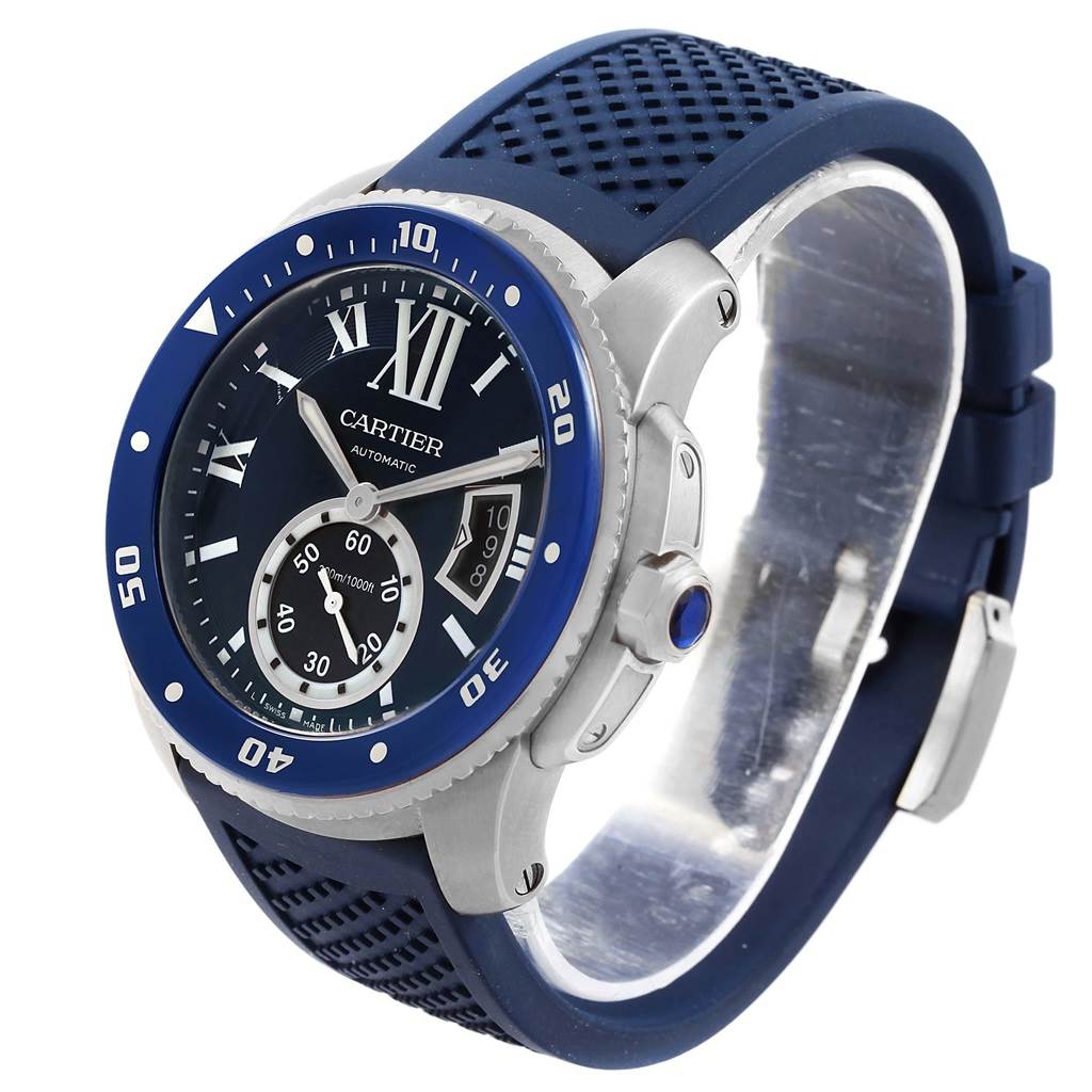The image shows a Calibre de Cartier watch by Cartier at a three-quarter angle, displaying the dial, bezel, and band.