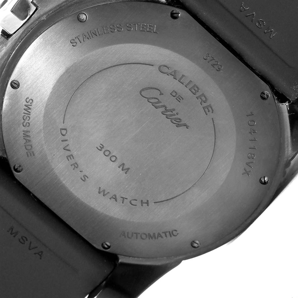 The image shows the back case of a Calibre de Cartier watch by Cartier, highlighting details like water resistance and material.