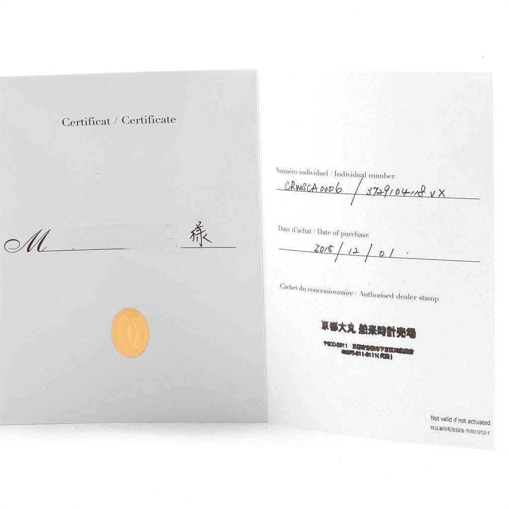 The image shows the certificate and warranty card for the Calibre de Cartier watch by Cartier.