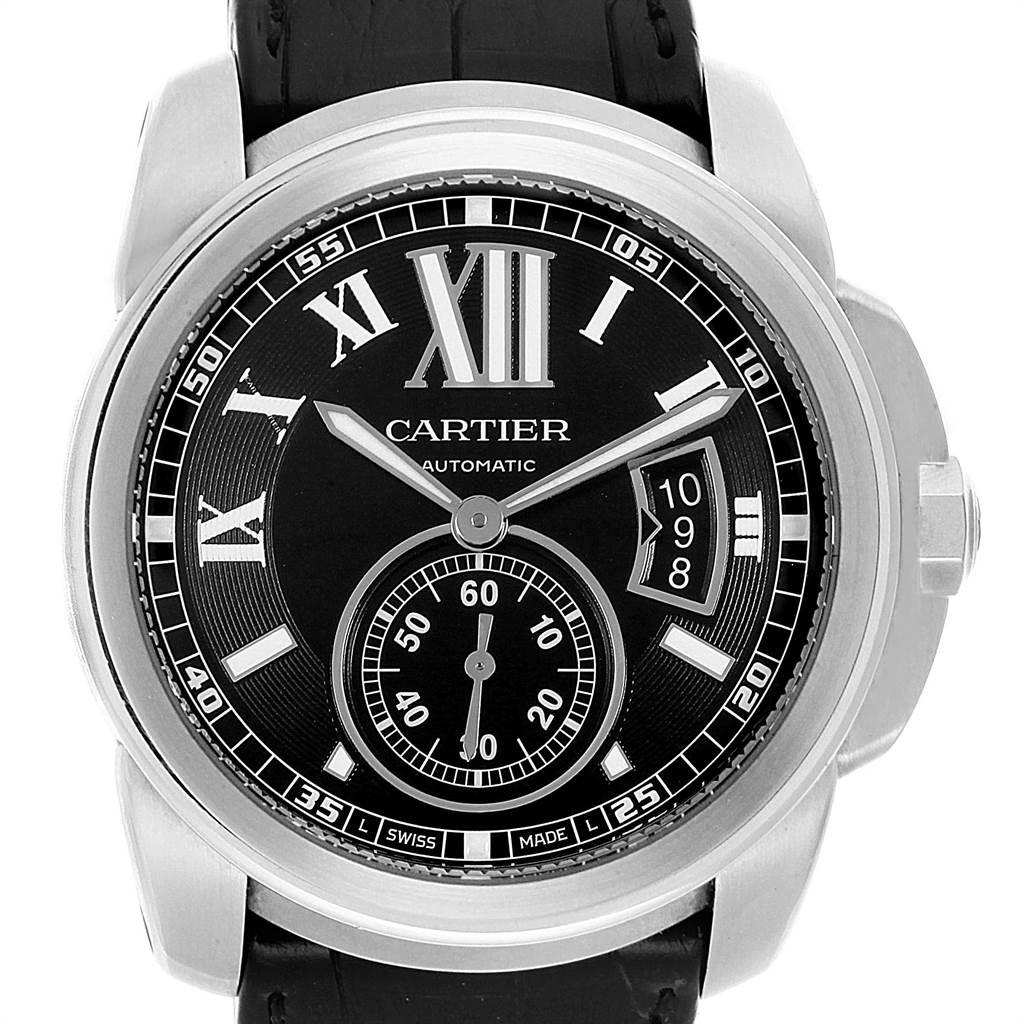 The image shows a front view of the Calibre de Cartier watch by Cartier, displaying the dial, hands, subdial, and part of the strap.