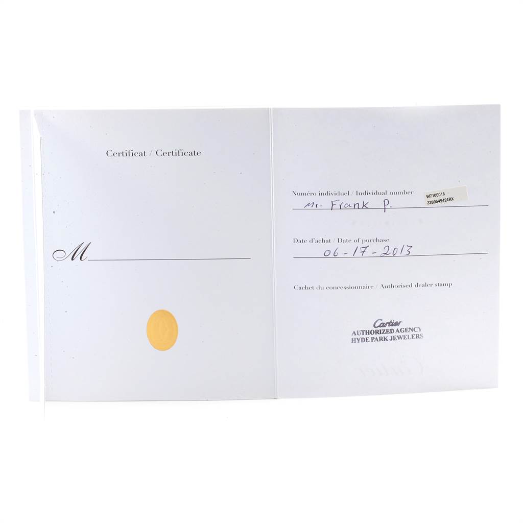 The image shows the warranty certificate for a Calibre de Cartier model by Cartier.