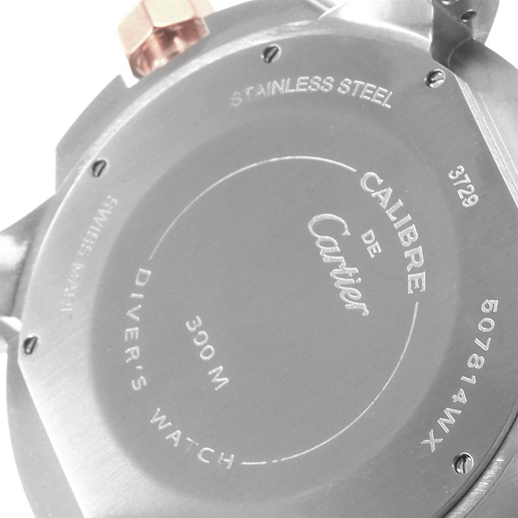 The image shows the back case of a Calibre de Cartier diver's watch by Cartier, highlighting its stainless steel construction and water resistance.