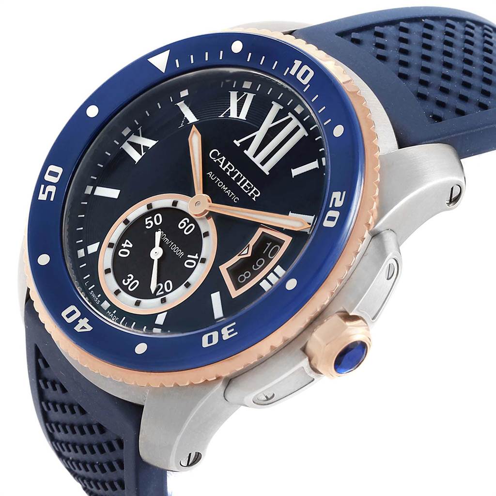 The image shows a close-up angled view of a Calibre de Cartier watch with the face, bezel, crown, and band visible.