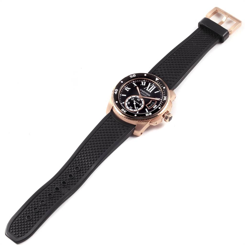 rose gold watch with black dial
