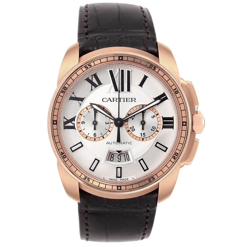 This image shows a front view of the Calibre de Cartier watch by Cartier, featuring multiple dials and Roman numeral markers.