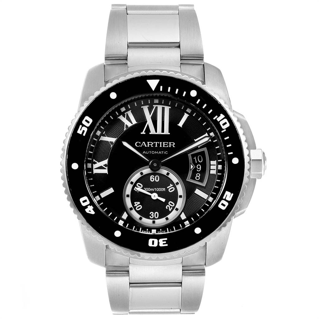 The image shows a front view of the Calibre de Cartier watch by Cartier, detailing its face, bezel, and stainless steel bracelet.