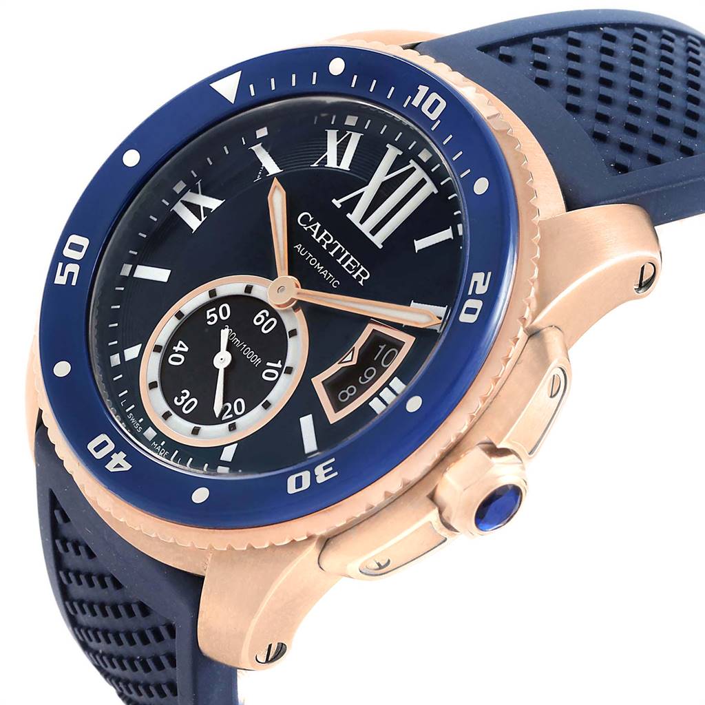 The image shows a Calibre de Cartier watch by Cartier viewed from a front-side angle, highlighting the face, bezel, and crown.