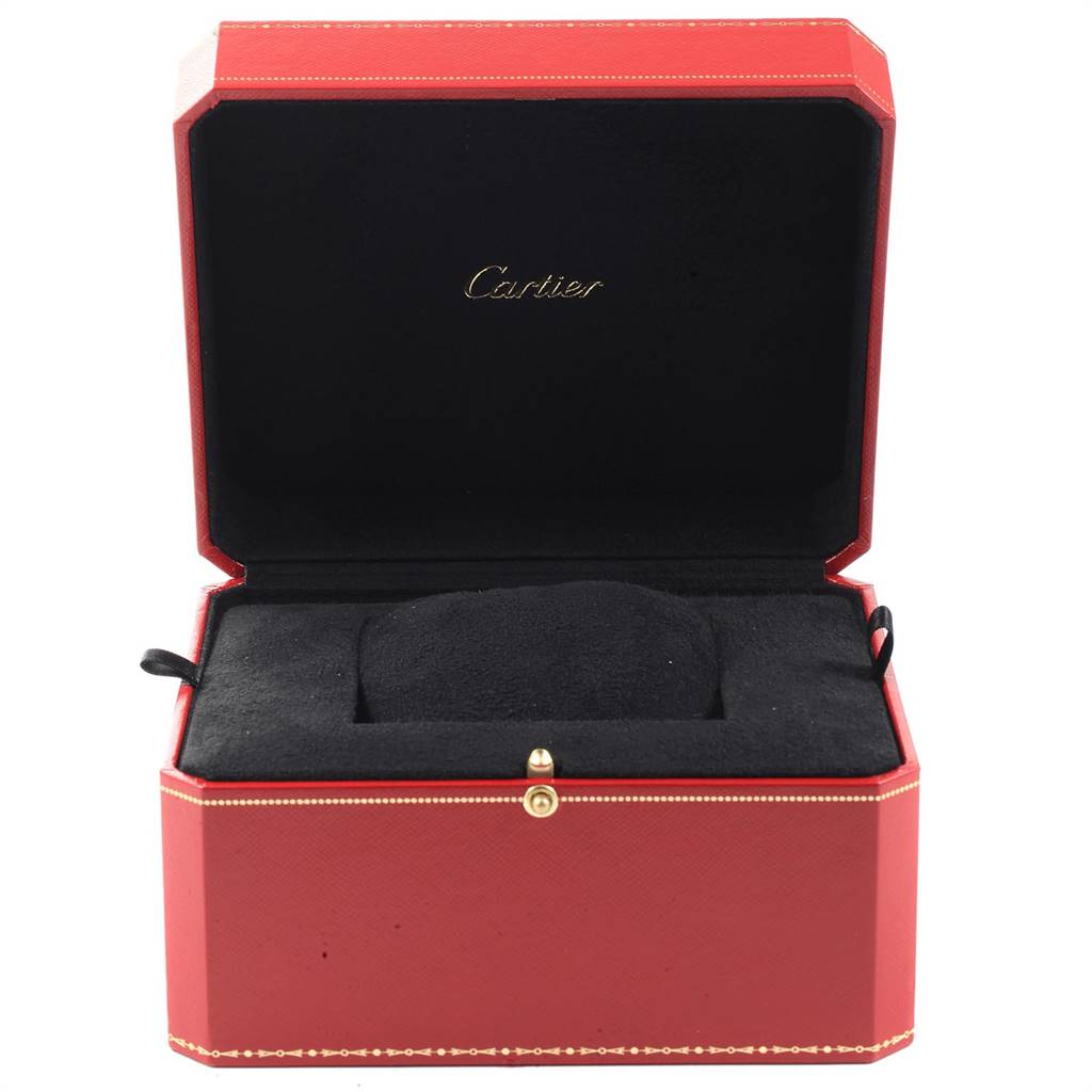 The image shows an open Cartier watch box for the Calibre de Cartier model with its black interior and red exterior.