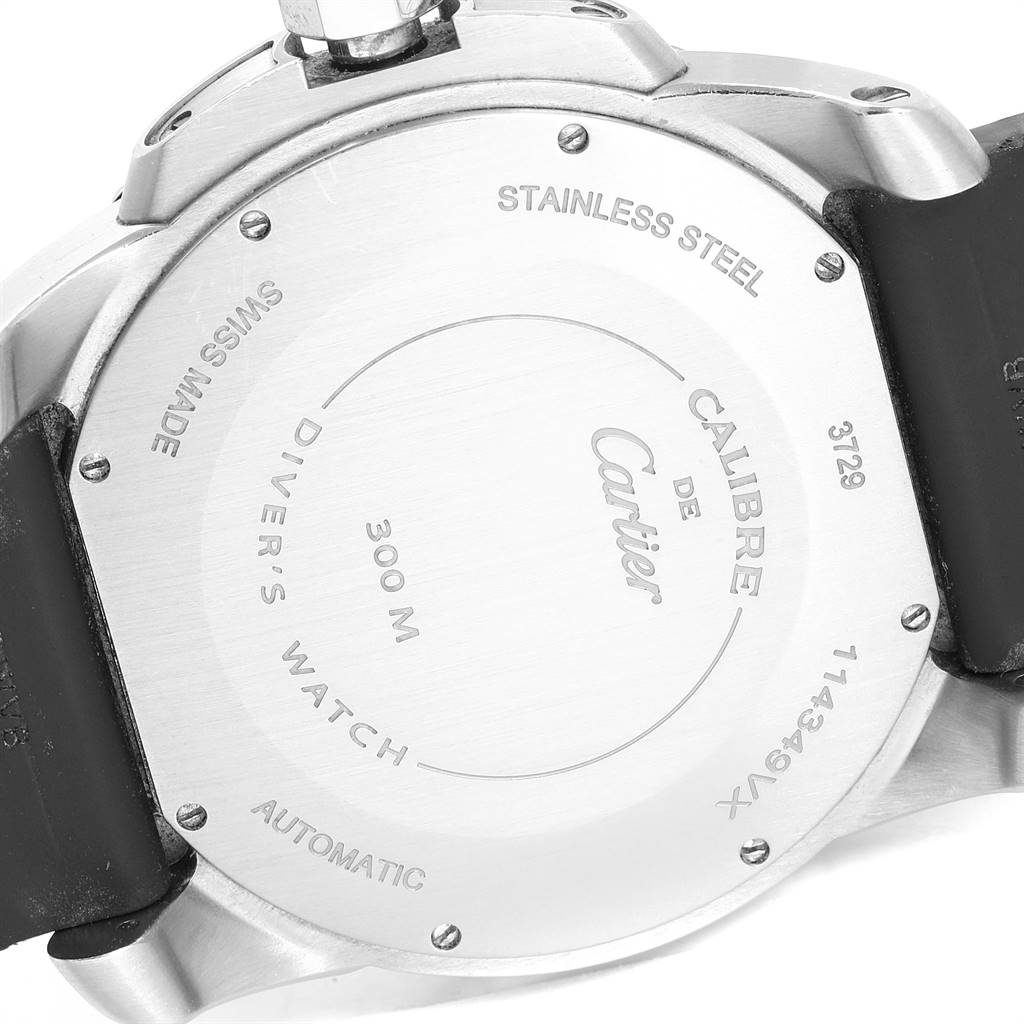The image shows the back case of a Calibre de Cartier watch by Cartier, highlighting its stainless steel construction and specifications.