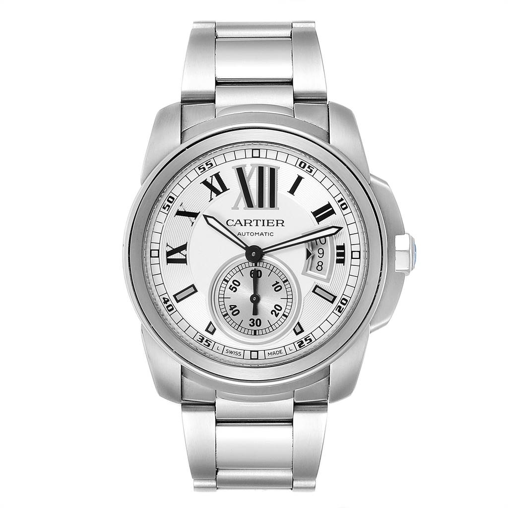 The image shows a front view of the Calibre de Cartier watch by Cartier, displaying its face, bezel, and metal bracelet.