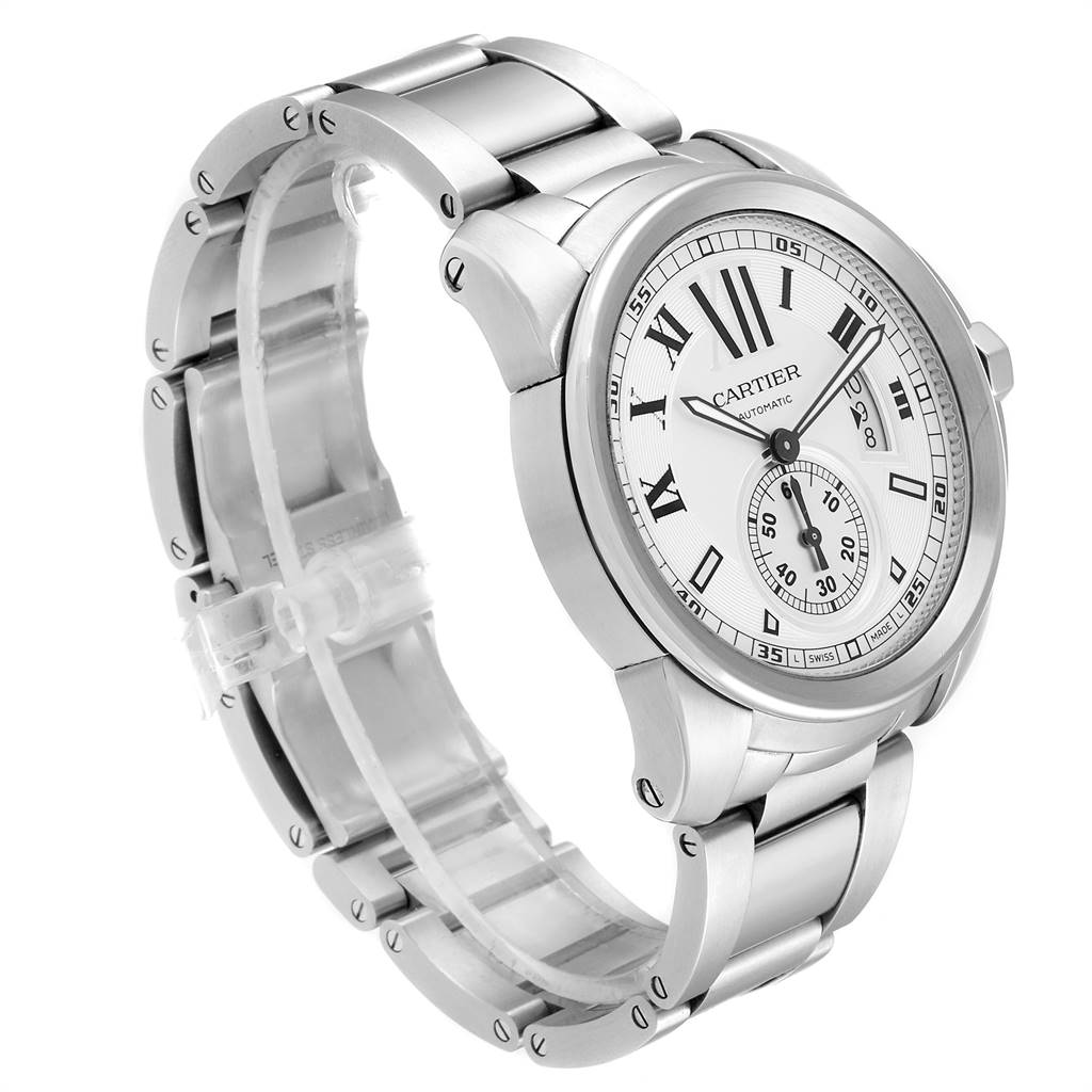 The image shows a side angle of the Calibre de Cartier watch by Cartier, highlighting the face, bezel, and metal bracelet.
