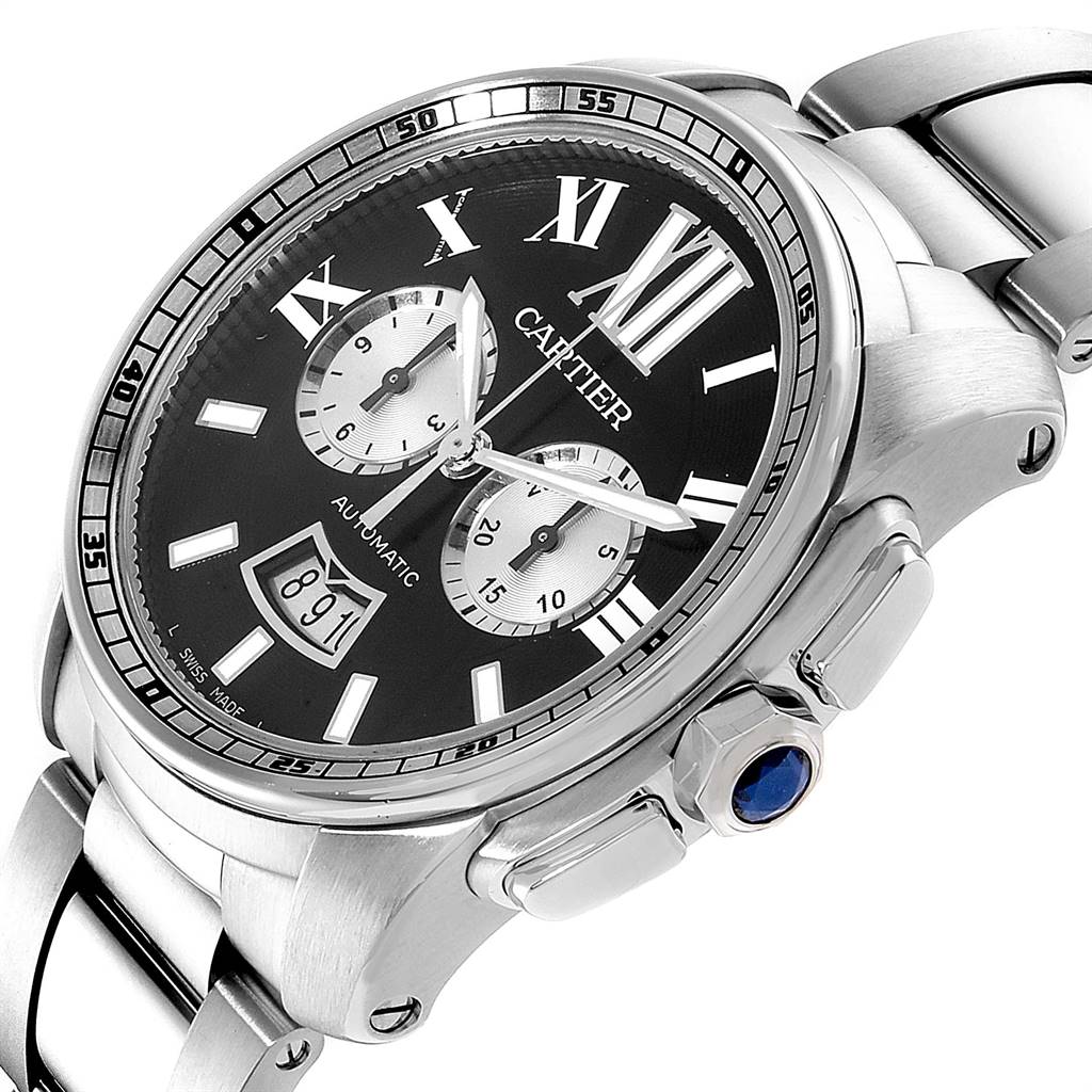 The image shows a Calibre de Cartier watch by Cartier at an angled close-up, highlighting the dial, bezel, and part of the bracelet.