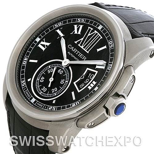 This angled view shows the face, crown, and part of the strap of the Calibre de Cartier watch by Cartier.