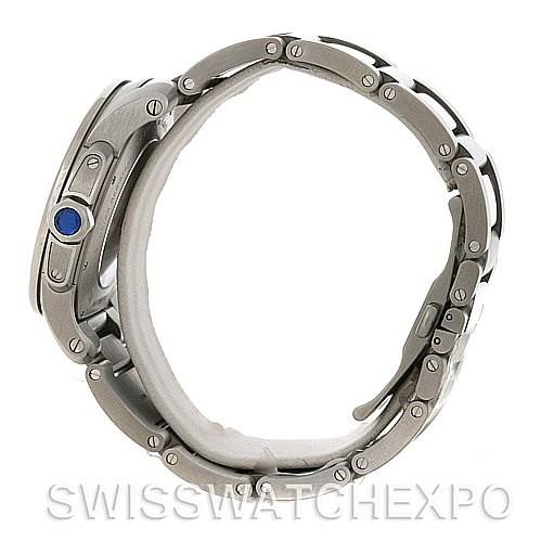 The image shows a Calibre de Cartier watch by Cartier viewed from the side, displaying the metal bracelet and crown.