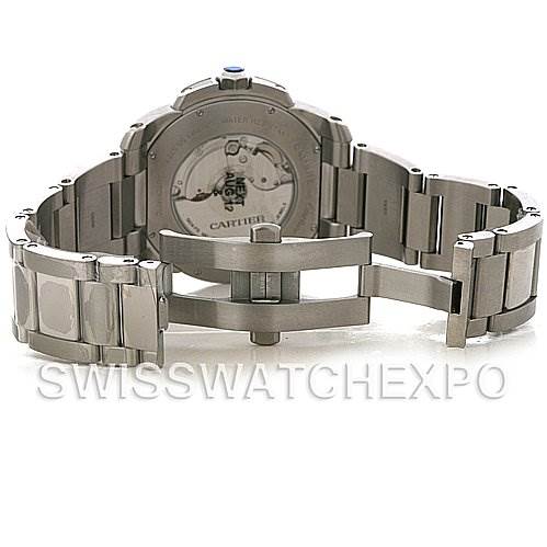 The image shows the back and bracelet of the Calibre de Cartier watch by Cartier, with the deployment clasp open.