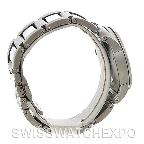 The image shows a side view of the Calibre de Cartier watch by Cartier, highlighting its metal bracelet and case.