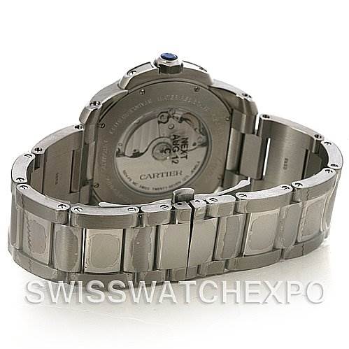 The image shows the back and bracelet of a Calibre de Cartier watch by Cartier, highlighting the clasp and back case details.
