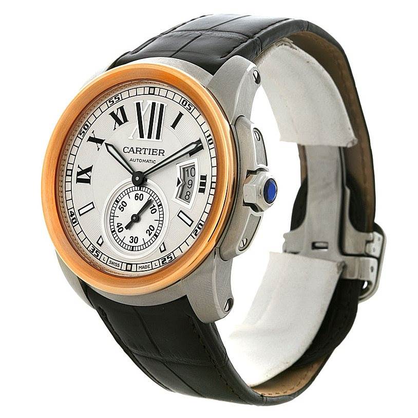 The image shows a side angle view of a Calibre de Cartier model watch by Cartier, highlighting the face, bezel, crown, and strap.