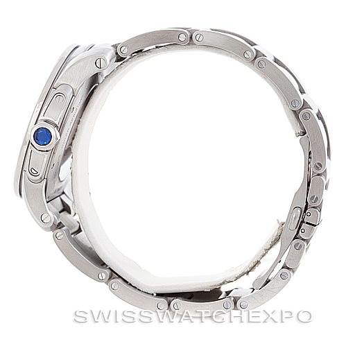 The image shows a side view of the Calibre de Cartier watch by Cartier, highlighting the case, sapphire crown, and bracelet.